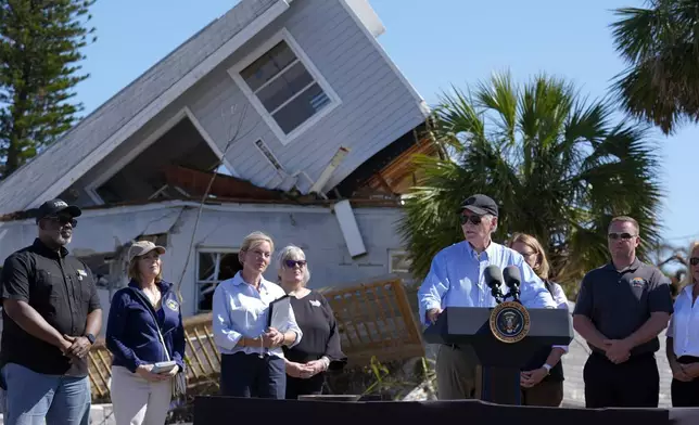 President Joe Biden speaks following a briefing by federal, state, and local officials in St. Pete Beach, Fla., during a tour of areas affected by Hurricane Milton, Sunday, Oct. 13, 2024. (AP Photo/Manuel Balce Ceneta)