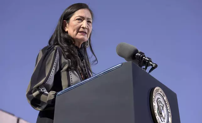 Interior Secretary Deb Haaland speaks at the Gila Crossing Community School in the Gila River Indian Community reservation in Laveen, Ariz., Friday, Oct. 25, 2024. (AP Photo/Manuel Balce Ceneta)