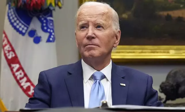 President Joe Biden listens during a briefing on the government's response to Hurricane Helene in the Roosevelt Room of the White House in Washington, Tuesday, Oct. 1, 2024. (AP Photo/Mark Schiefelbein)