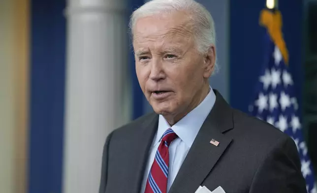 President Joe Biden speaks during a surprise appearance to take questions during the daily briefing at the White House in Washington, Friday, Oct. 4, 2024. (AP Photo/Susan Walsh)