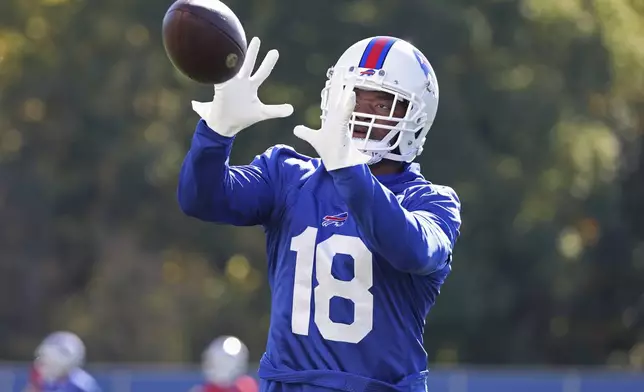 Buffalo Bills wide receiver Amari Cooper (18) catches a pass during NFL football practice in Orchard Park, N.Y., Thursday, Oct. 17, 2024. (AP Photo/Jeffrey T. Barnes)