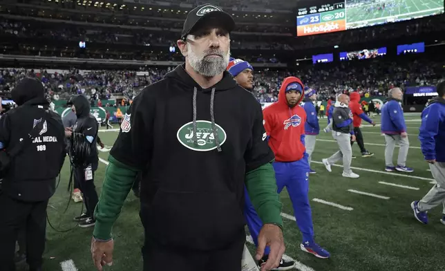 New York Jets interim head coach Jeff Ulbrich walks off the field after an NFL football game against the Buffalo Bills in East Rutherford, N.J., Monday, Oct. 14, 2024. (AP Photo/Adam Hunger)