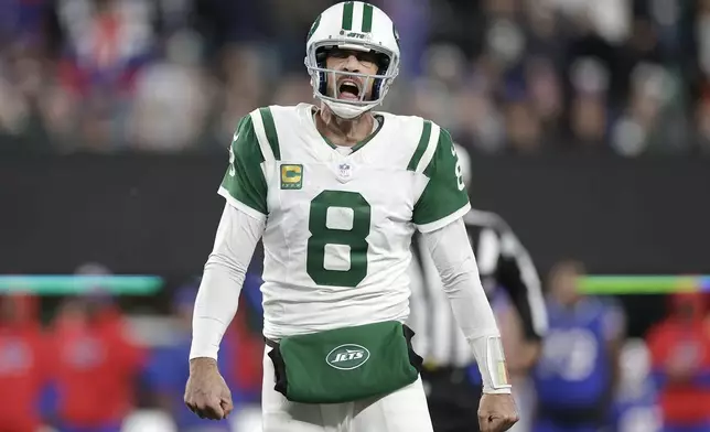 New York Jets quarterback Aaron Rodgers (8) reacts during the second half of an NFL football game against the Buffalo Bills in East Rutherford, N.J., Monday, Oct. 14, 2024. (AP Photo/Adam Hunger)