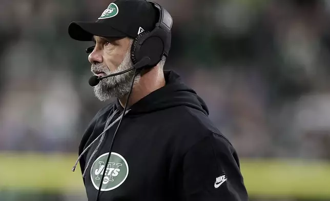 New York Jets interim head coach Jeff Ulbrich watches from the sideline during the first half of an NFL football game against the Buffalo Bills in East Rutherford, N.J., Monday, Oct. 14, 2024. (AP Photo/Adam Hunger)