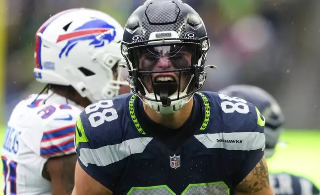 Seattle Seahawks tight end AJ Barner (88) reacts during the first half of an NFL football game against the Buffalo Bills, Sunday, Oct. 27, 2024, in Seattle. (AP Photo/Lindsey Wasson)