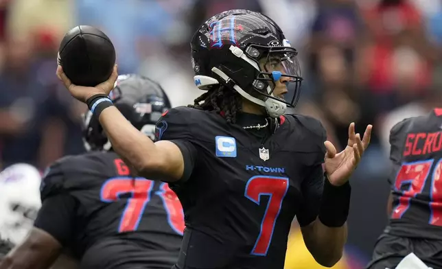 Houston Texans quarterback C.J. Stroud (7) throws a pass during the first half of an NFL football game against the Buffalo Bills, Sunday, Oct. 6, 2024, in Houston. (AP Photo/Eric Gay)