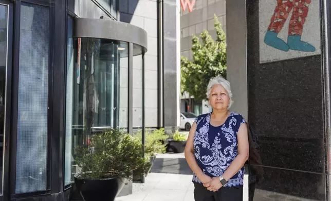 Unite Here Local 2 leader María Mata stands for a portrait in front of the W Hotel on Friday, Sept. 13, 2024, in San Francisco. (AP Photo/Juliana Yamada)