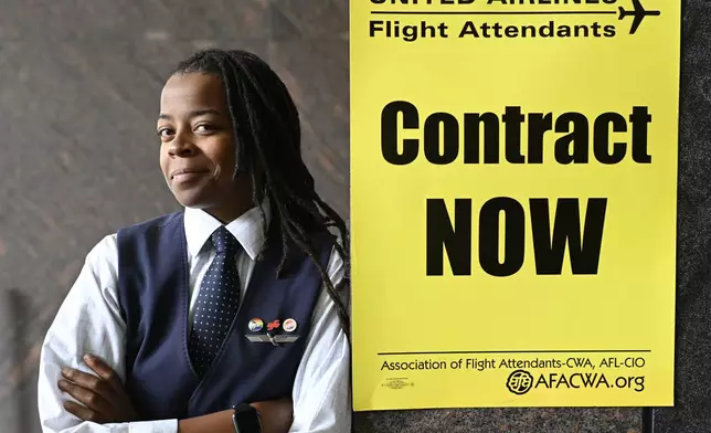 Keturah Johnson, international vice president for flight attendant union AFA-CWA, poses for a portrait in her headquarters office, Wednesday, Sept. 18, 2024, in Washington. (AP Photo/John McDonnell)