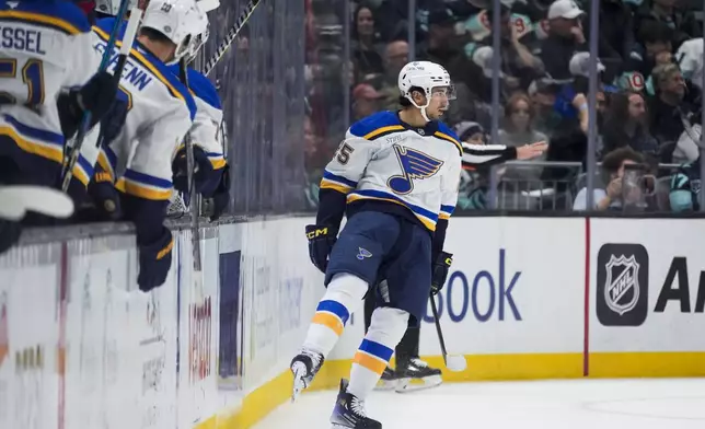 St. Louis Blues center Jordan Kyrou celebrates his goal against the Seattle Kraken during the second period of an NHL hockey game Tuesday, Oct. 8, 2024, in Seattle. (AP Photo/Lindsey Wasson)