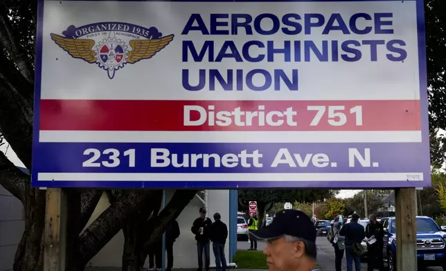 Boeing employees on strike arrive to vote on a new contract offer from the company Wednesday, Oct. 23, 2024, at the Aerospace Machinists Union hall in Renton, Wash. (AP Photo/Lindsey Wasson)