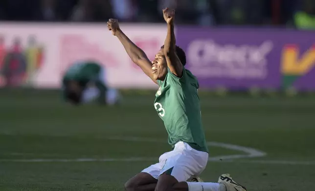 Bolivia's Diego Medina celebrates at the end of a qualifying soccer match against Colombia for the FIFA World Cup 2026 at Municipal de Villa Ingenio stadium in El Alto, Bolivia, Thursday, Oct. 10, 2024. (AP Photo/Juan Karita)