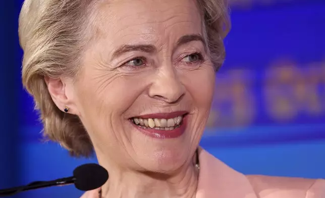 European Commission President Ursula von der Leyen smiles during a joint news conference with the President of the Council of Ministers of Bosnia and Herzegovina Borjana Kristo in Sarajevo, Bosnia, Friday, Oct. 25, 2024. (AP Photo/Armin Durgut)