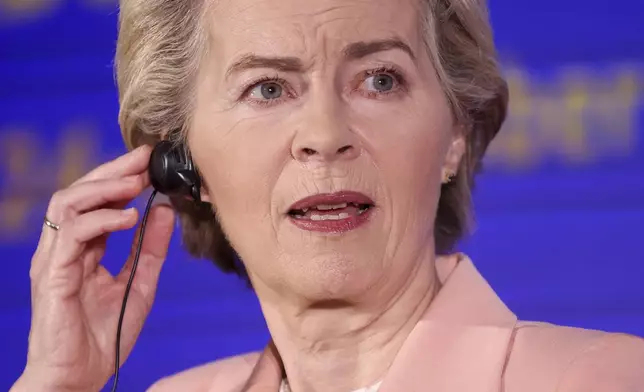 European Commission President Ursula von der Leyen adjusts her headset during a joint news conference with the President of the Council of Ministers of Bosnia and Herzegovina Borjana Kristo in Sarajevo, Bosnia, Friday, Oct. 25, 2024. (AP Photo/Armin Durgut)