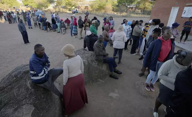 Residents wait for their turns to cast their votes during an election to decide if it keeps faith with one of the Africa's longest-ruling parties, in Gaborone, Botswana, Wednesday, Oct. 30, 2024. (AP Photo/Themba Hadebe)