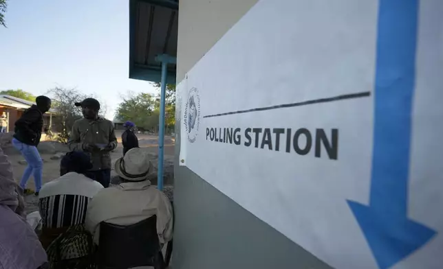 Residents wait for their turns to cast their votes during an election to decide if it keeps faith with one of the Africa's longest-ruling parties, in Gaborone, Botswana, Wednesday, Oct. 30, 2024. (AP Photo/Themba Hadebe)