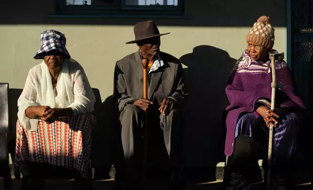 Residents wait their turn to cast their vote during the elections in Gaborone, Botswana, Wednesday, Oct. 30, 2024. (AP Photo/Themba Hadebe)