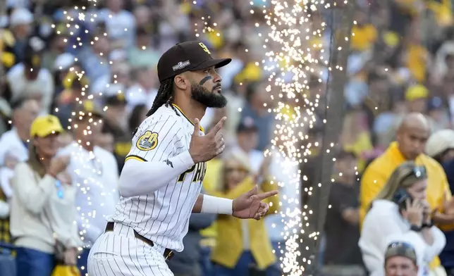 San Diego Padres' Fernando Tatis Jr. is introduced before Game 1 of an NL Wild Card Series baseball game against the Atlanta Braves, Tuesday, Oct. 1, 2024, in San Diego. (AP Photo/Gregory Bull)