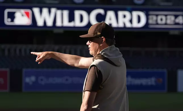 San Diego Padres manager Mike Shildt points during a practice a day before the first game of a National League wild-card baseball series against the Atlanta Braves, Monday, Sept. 30, 2024, in San Diego. (AP Photo/Gregory Bull)