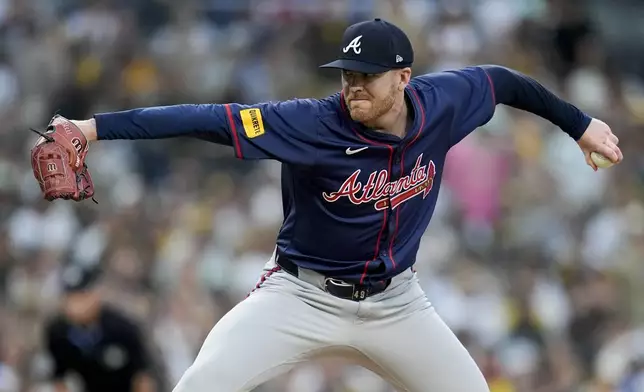 Atlanta Braves relief pitcher Aaron Bummer throws to a San Diego Padres batter during the second inning in Game 1 of an NL Wild Card Series baseball game Tuesday, Oct. 1, 2024, in San Diego. (AP Photo/Gregory Bull)