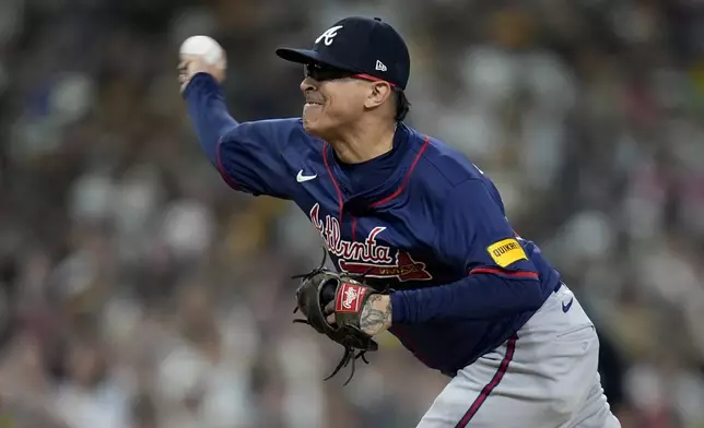 Atlanta Braves pitcher Jesse Chavez throws to a San Diego Padres batter during the sixth inning in Game 1 of an NL Wild Card Series baseball game Tuesday, Oct. 1, 2024, in San Diego. (AP Photo/Gregory Bull)