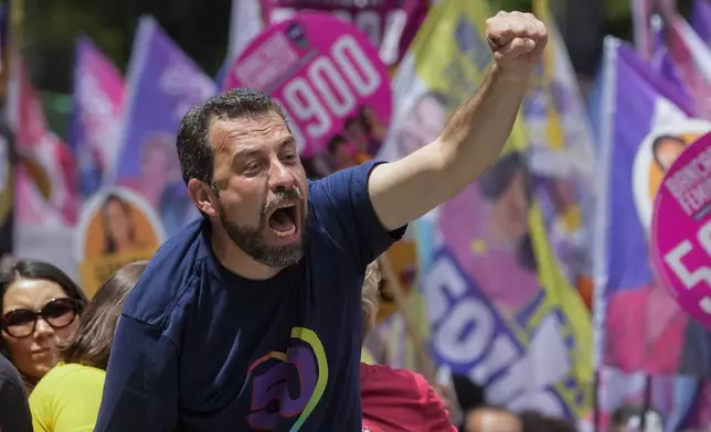 Mayoral candidate Guilherme Boulos of the Socialism and Liberty Party campaigns the day before elections in Sao Paulo, Saturday, Oct. 5, 2024. (AP Photo/Andre Penner)