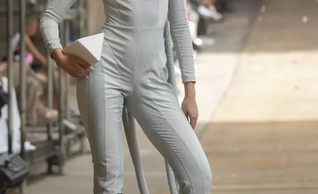A model wears a creation from the As Marias collection at the Oficina Theater during Sao Paulo Fashion Week in Sao Paulo, Brazil, Friday, Oct. 18, 2024. (AP Photo/Andre Penner)