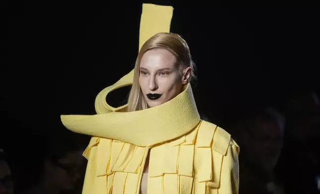 A model wears a creation from the Weider Silveiro collection during Sao Paulo Fashion Week in Sao Paulo, Wednesday, Oct. 16, 2024. (AP Photo/Andre Penner)