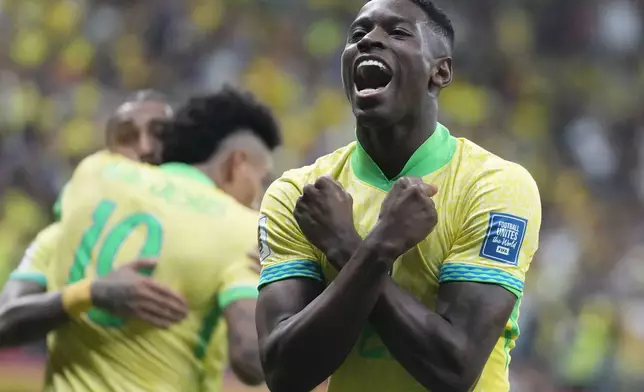 Brazil's Luiz Henrique celebrates scoring his side's fourth goal against Peru during a qualifying soccer match for the FIFA World Cup 2026 at Mane Garrincha Stadium in Brasilia, Brazil, Tuesday, Oct. 15, 2024. (AP Photo/Eraldo Peres)