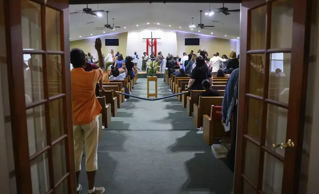 Mt. Olive Baptist Church holds a service, Sunday, Aug. 18, 2024, in Turner Station, Md. Turner Station is located near the former site of the Francis Scott Key Bridge, which collapsed in March. (AP Photo/Steve Ruark)