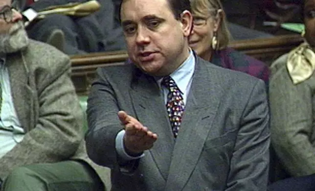 FILE - Alex Salmond speaks during a debate following the Government's defeat on their fishing policy on Dec. 19, 1995. (PA via AP, File)