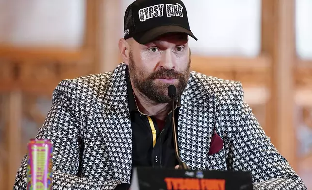 Heavyweight boxer Tyson Fury attends a press conference at the Guildhall, London, Wednesday Oct. 23, 2024. (Zac Goodwin/PA via AP)