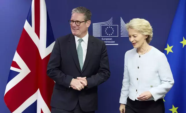 Britain's Prime Minister Keir Starmer, left, meets European Commission president Ursula von der Leyen at the European Commission headquarters in Brussels, Wednesday, Oct. 2, 2024. (Benjamin Cremel, Pool Photo via AP)