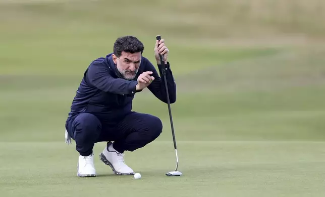 Yasir Al-Rumayyan on the seventeenth green during day three of the Alfred Dunhill Links Championship at the Old Course St. Andrews, Scotland, Saturday Oct. 5, 2024. (Robert Perry/PA via AP)