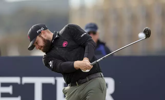 England's Tyrrell Hatton tees off the 4th , during day three of the Alfred Dunhill Links Championship at the Old Course, St. Andrews, Scotland, Saturday, Oct. 5, 2024. (Robert Perry/PA via AP)