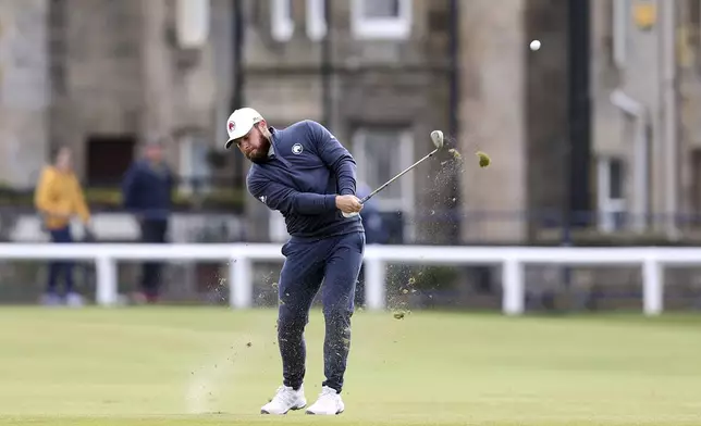 Tyrrell Hatton plays down the first fairway during day Four of the Alfred Dunhill Links Championship, at the Old Course St. Andrews, Britain, Sunday Oct. 6, 2024. (Robert Perry/PA via AP)