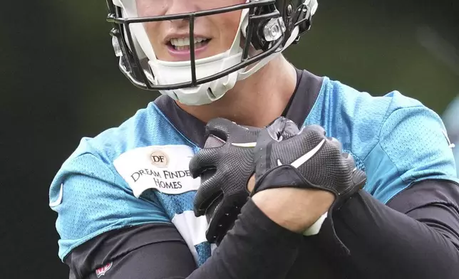 Jacksonville Jaguars NFL football wide receiver Louis Rees-Zammit (84) practices at The Grove in Watford, England, Wednesday, Oct. 16, 2024. (AP Photo/Kin Cheung)