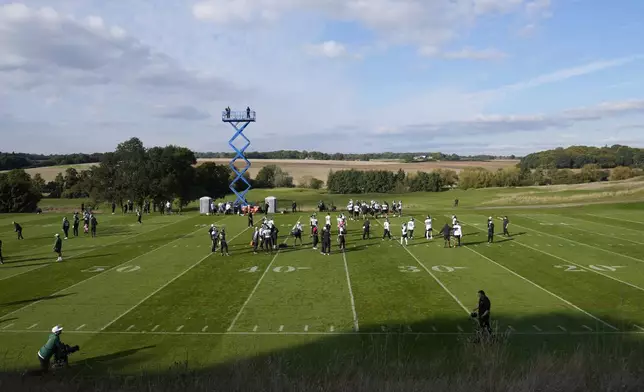 The New York Jets participate in a training session in Ware, England, Friday, Oct. 4, 2024, ahead of the game between New York Jets and Minnesota Vikings at the Tottenham Hotspur stadium on Sunday. (AP Photo/Alastair Grant)