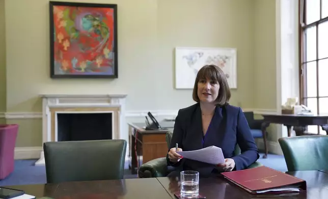 FILE - Britain's Chancellor Rachel Reeves prepares to deliver a speech at the Treasury to an audience of leading business figures and senior stakeholders, announcing the first steps the new government will be taking to deliver economic growth, in London, Monday July 8, 2024. (Jonathan Brady/Pool Photo via AP, File)