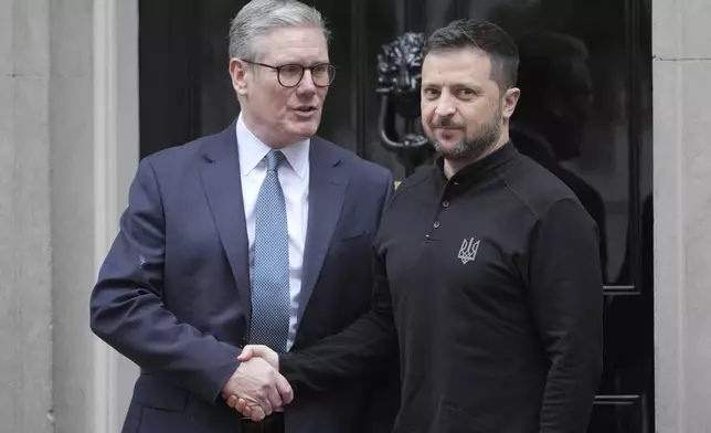 FILE - Britain's Prime Minister Keir Starmer welcomes Ukrainian President Volodymyr Zelenskyy to 10 Downing Street in London, Thursday, Oct. 10, 2024. (AP Photo/Kin Cheung, File)