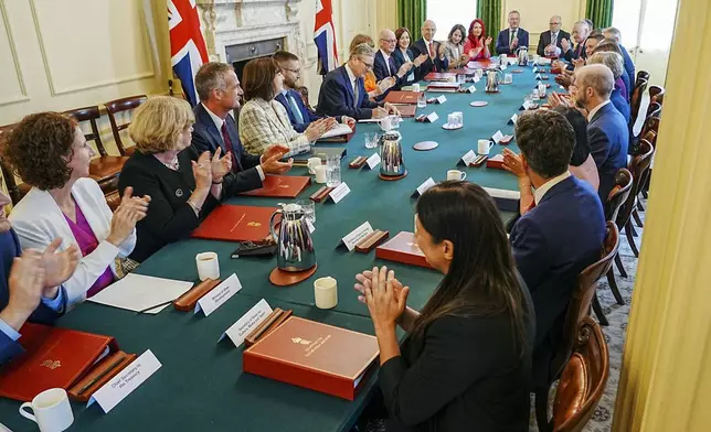 FILE - Britain's Prime Minister Keir Starmer, center, with Deputy Prime Minister Angela Rayner, center right, hosts his first Cabinet meeting at 10 Downing Street, London, Saturday July 6, 2024. following the General Election victory for the Labour Party. (Chris Eades/Pool via AP, File)