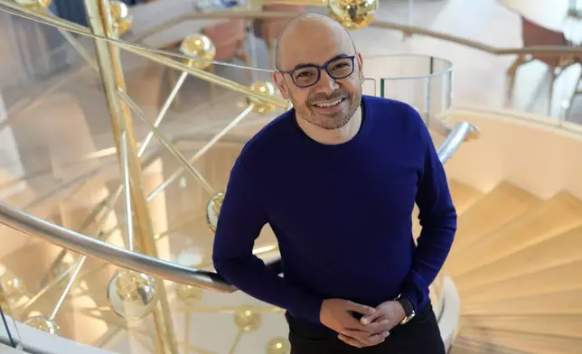 Demis Hassabis, CEO of DeepMind Technologies, the AI division behind Gemini, poses for a photo at the Google DeepMind offices in London, Wednesday, Oct. 9, 2024 after being awarded with the Nobel Prize in Chemistry.(AP Photo/Alastair Grant)