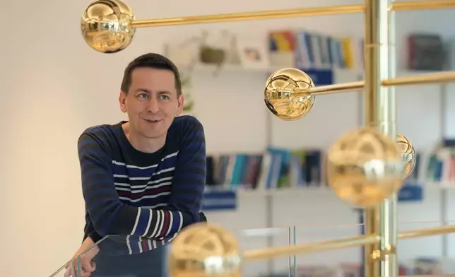 Researcher John Jumper poses for a photo at the Google DeepMind offices in London, Wednesday, Oct. 9, 2024 after being awarded with the Nobel Prize in Chemistry.(AP Photo/Alastair Grant)