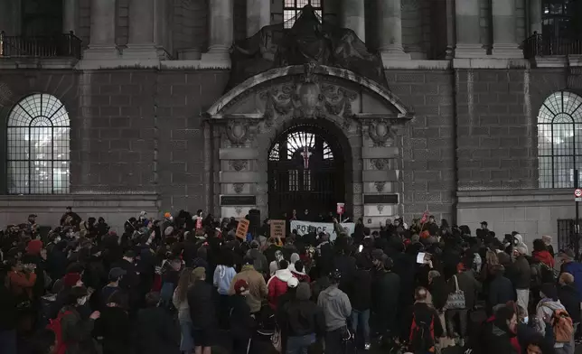 People demonstrate outside the Old Bailey in central London, Monday Oct. 21, 2024, after the London police officer who fatally shot Chris Kaba was acquitted of murder. (Jordan Pettitt/PA via AP)