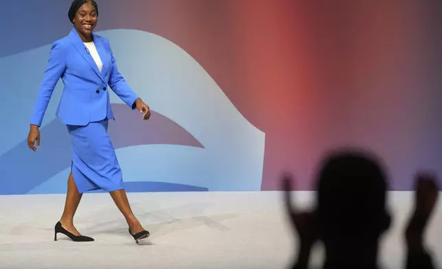 Conservative leadership candidate Kemi Badenoch addresses members during the Conservative Party Conference at the International Convention Centre in Birmingham, England, Wednesday, Oct. 2, 2024.(AP Photo/Kin Cheung)