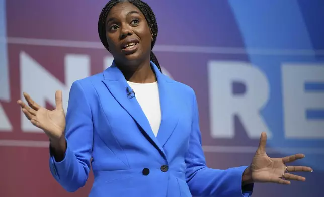 Conservative leadership candidate Kemi Badenoch addresses members during the Conservative Party Conference at the International Convention Centre in Birmingham, England, Wednesday, Oct. 2, 2024.(AP Photo/Kin Cheung)