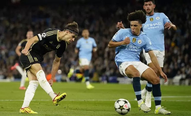 Sparta Praha's Veljko Birmancevic makes an attempt to score during the Champions League opening phase soccer match between Manchester City and Sparta Praha at the Etihad Stadium in Manchester, England, Wednesday, Oct.23 , 2024. (AP Photo/Dave Thompson)