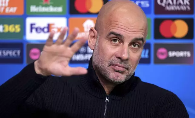 Manchester City manager Pep Guardiola attends the press conference, a day before the Champions League soccer match against Sparta Praha, at the City Football Academy in Manchester, England, Tuesday, Oct. 22, 2024. (Martin Rickett/PA via AP)