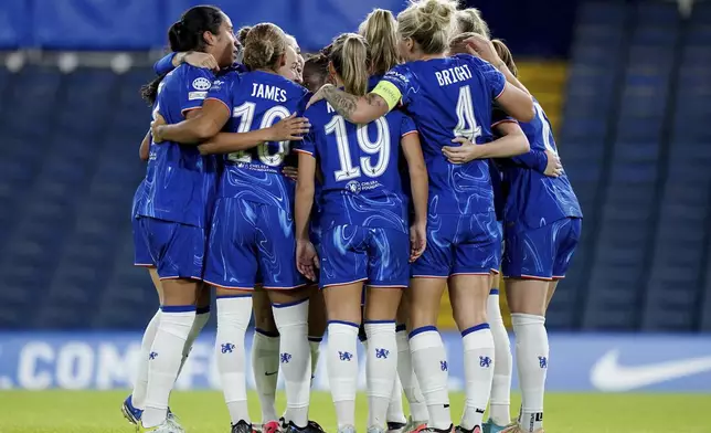 Chelsea's players huddle up before the women's Champions League group B soccer match between FC Chelsea and Real Madrid in London, England, Tuesday, Oct. 8, 2024. (Zac Goodwin/PA via AP)