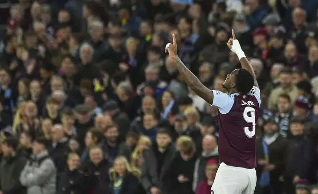 Aston Villa's Jhon Duran celebrates after scoring the opening goal during the Champions League opening phase soccer match between Aston Villa and Bayern Munich, at Villa Park in Birmingham, England, Wednesday, Oct. 2, 2024. (AP Photo/Rui Vieira)