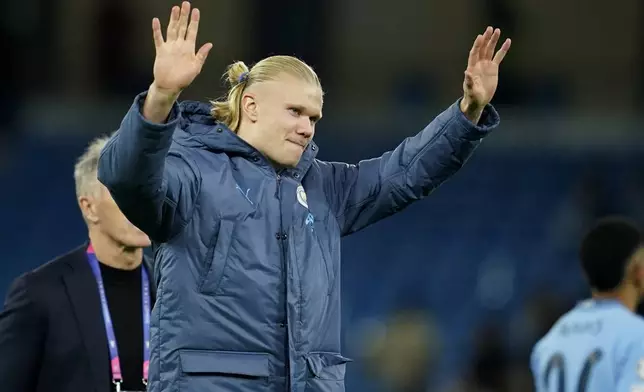Manchester City's Erling Haaland celebrates at the end of the Champions League opening phase soccer match between Manchester City and Sparta Praha at the Etihad Stadium in Manchester, England, Wednesday, Oct.23 , 2024. (AP Photo/Dave Thompson)